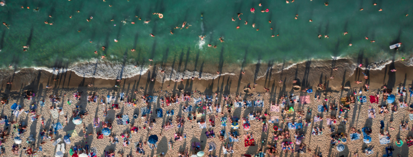 aerial view of crowd of people on the beach